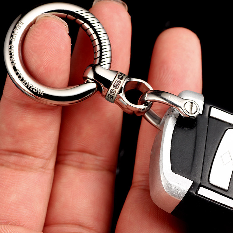 Titanium inlaid silver capsule universal joint keychain accessories, titanium universal joint ring, handmade car keychain, 360 degree rotation