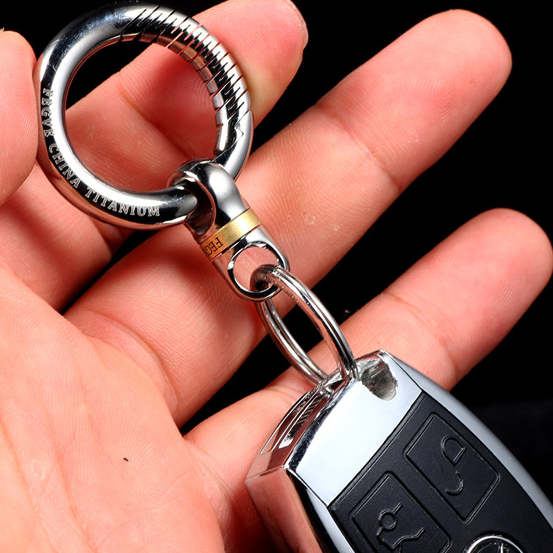 Automotive titanium alloy capsule universal joint keychain, pure titanium universal joint, stainless steel ring, special vehicle modification, rotation