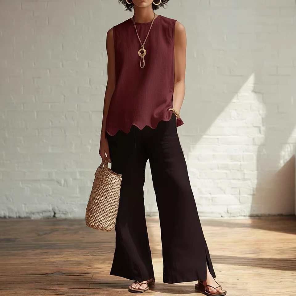 Solid Crewneck Sleeveless Wavy Hem Blouse