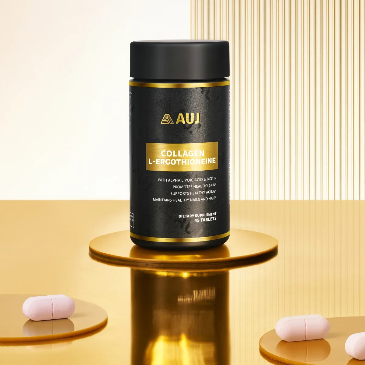 AUJ bottle and pink tablets on gold pedestals