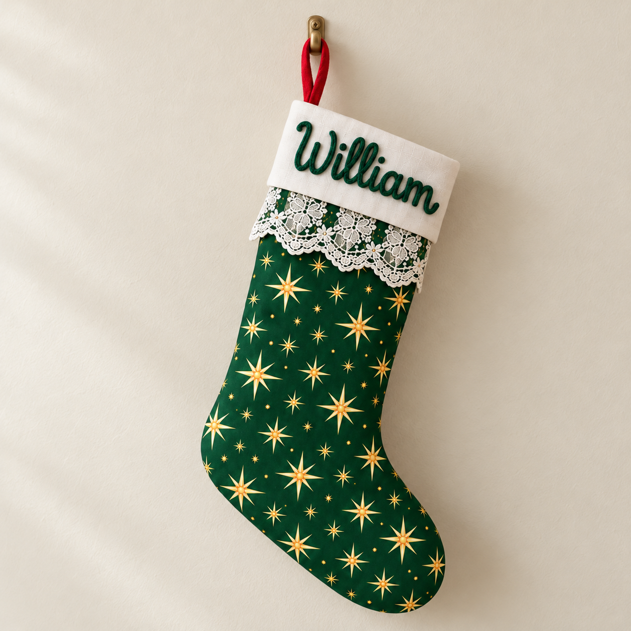 Grüner Weihnachtsstrumpf mit goldenen Sternen und Name William