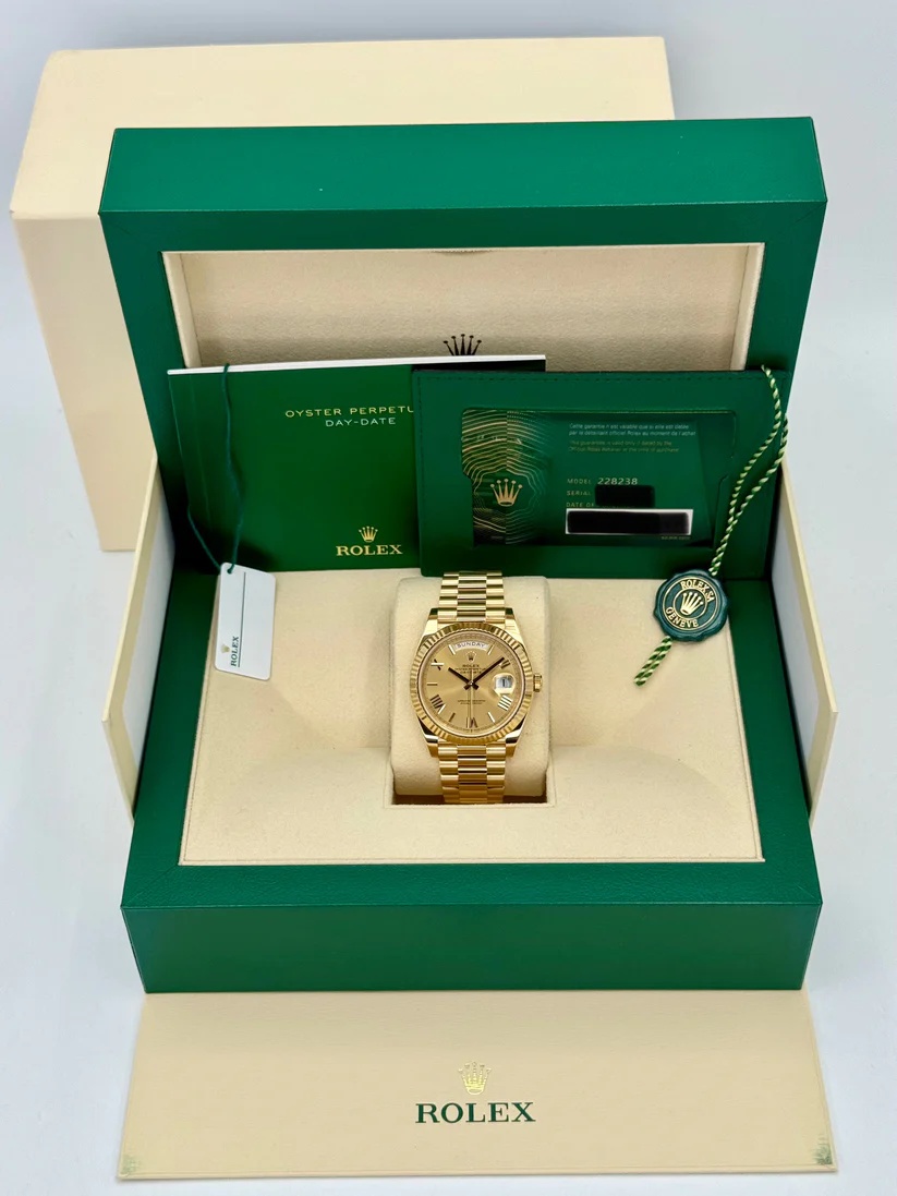 Rolex Day-Date President 40 mm Gelbgold Champagnerfarbenes Zifferblatt mit römischen Ziffern - 228238