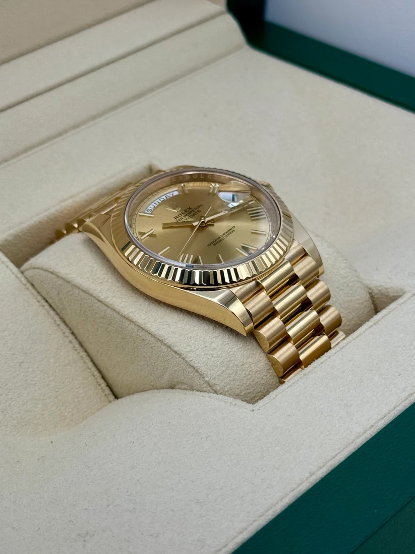Rolex Day-Date President 40 mm Gelbgold Champagnerfarbenes Zifferblatt mit römischen Ziffern - 228238