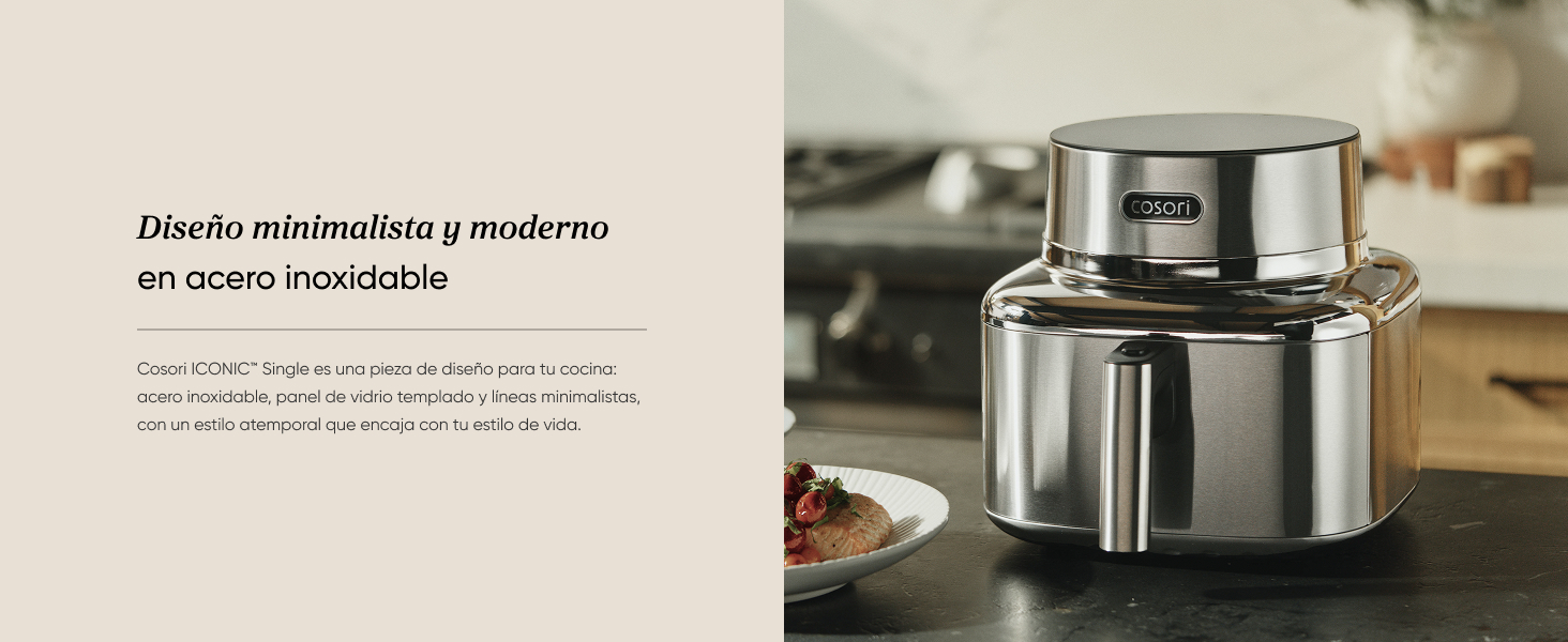 La olla o aparato de cocina de acero inoxidable se muestra sobre un fondo neutro con superficie reflectante.