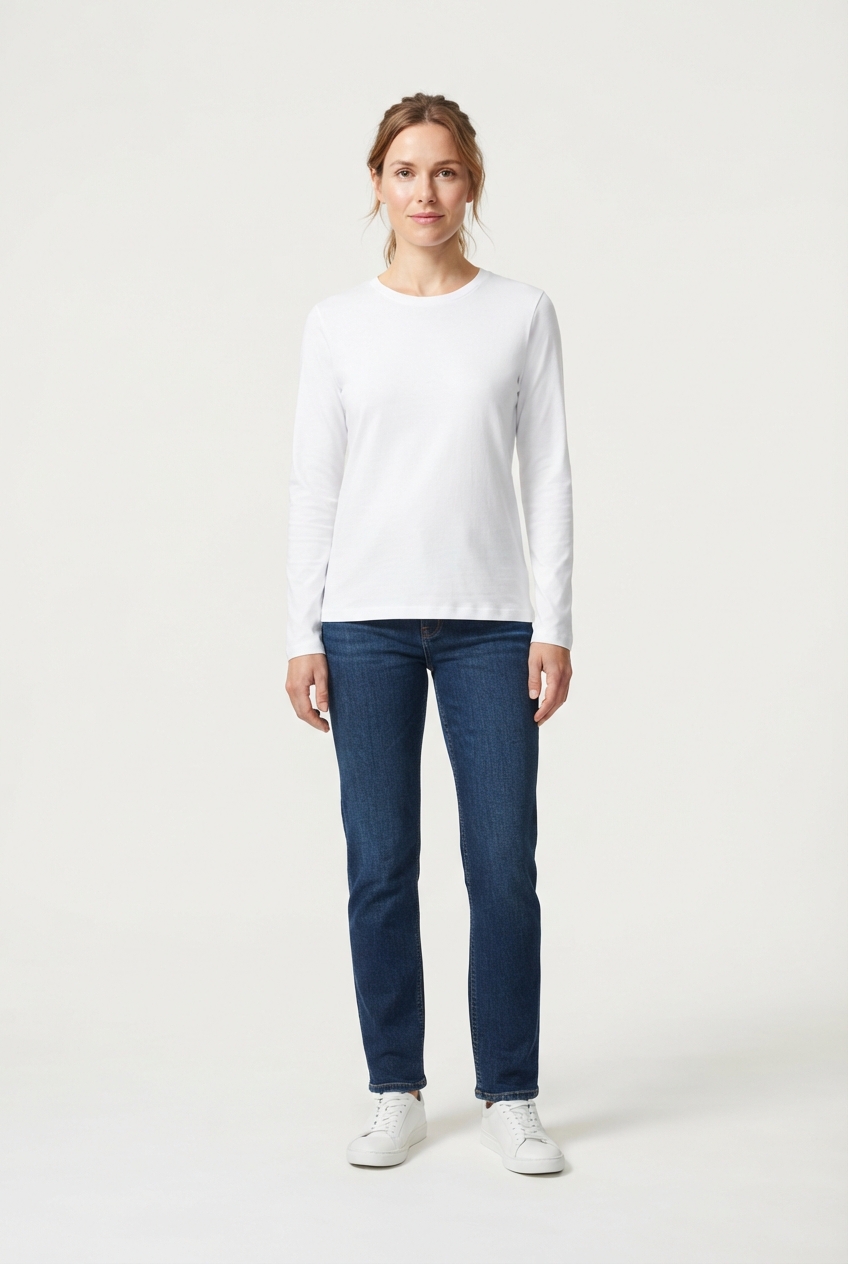 Minimalist boys long-sleeve T-shirt in white shown on model