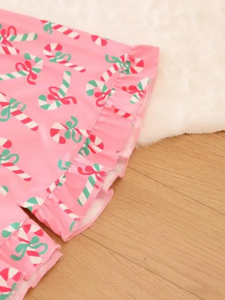 2 pieces of ladies' Christmas cane candy printed short sleeved shorts sleepwear set with buttons, collars, bows, suitable for comfortable and casual home wear in all seasons 2 pieces of ladies' Christmas cane candy printed short sleeved shorts sleepwear set with buttons, collars, bows, suitable for comfortable and casual home wear in all seasons