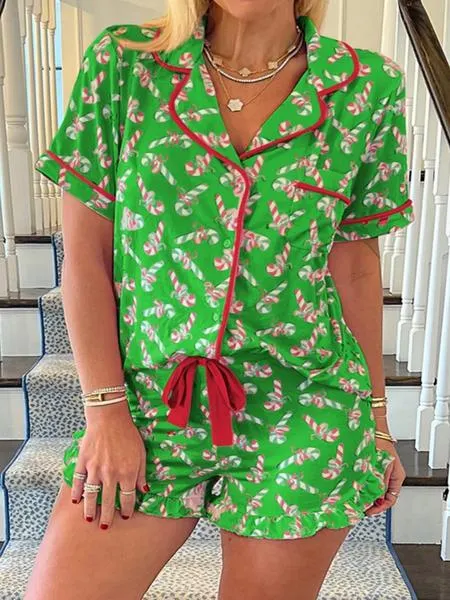 2 pieces of ladies' Christmas cane candy printed short sleeved shorts sleepwear set with buttons, collars, bows, suitable for comfortable and casual home wear in all seasons 2 pieces of ladies' Christmas cane candy printed short sleeved shorts sleepwear set with buttons, collars, bows, suitable for comfortable and casual home wear in all seasons