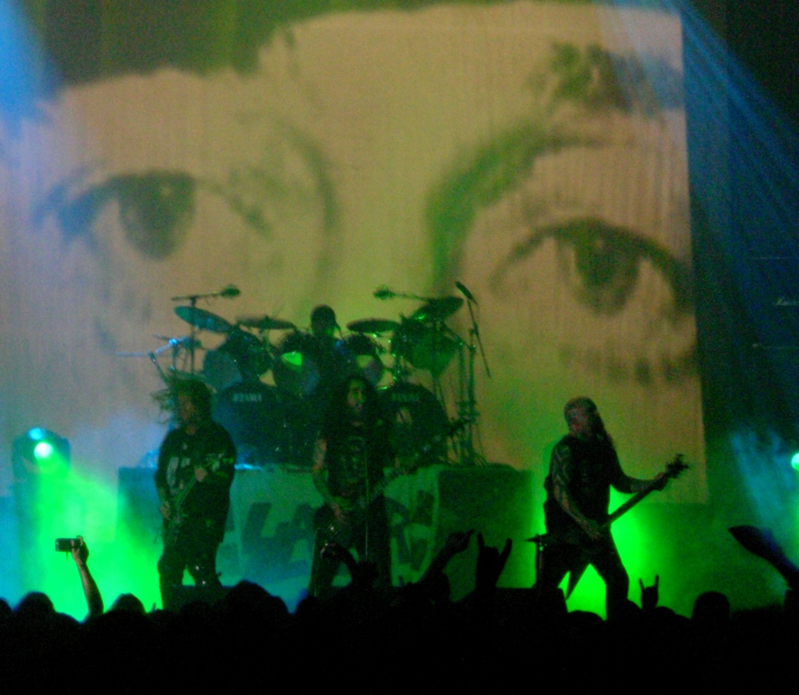 Slayer performing live on stage