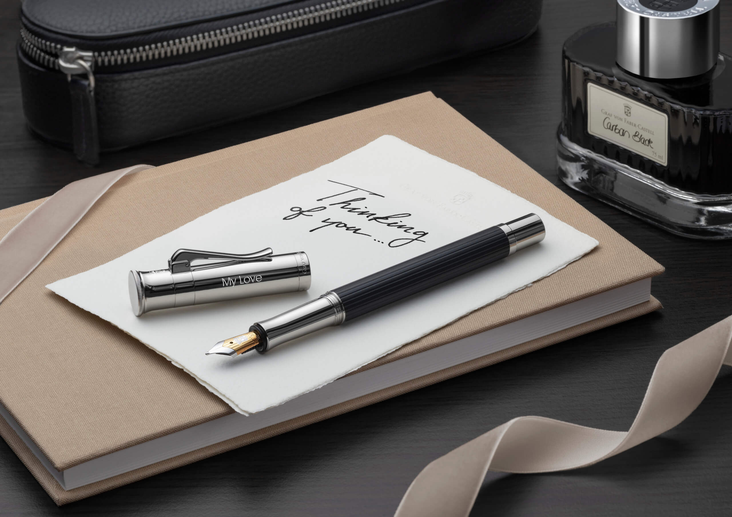Graf von Faber-Castell ebony fountain pen with platinum finish.