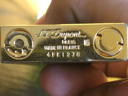 Non-authentic S.T. Dupont line 2 lighter with most commonly faked serial number, 4FK12J8