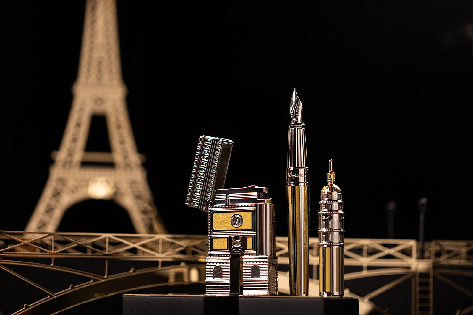 Limited edition pen and lighter set from S.T. Dupont, showcasing the craftsmanship and artistry of the brand.