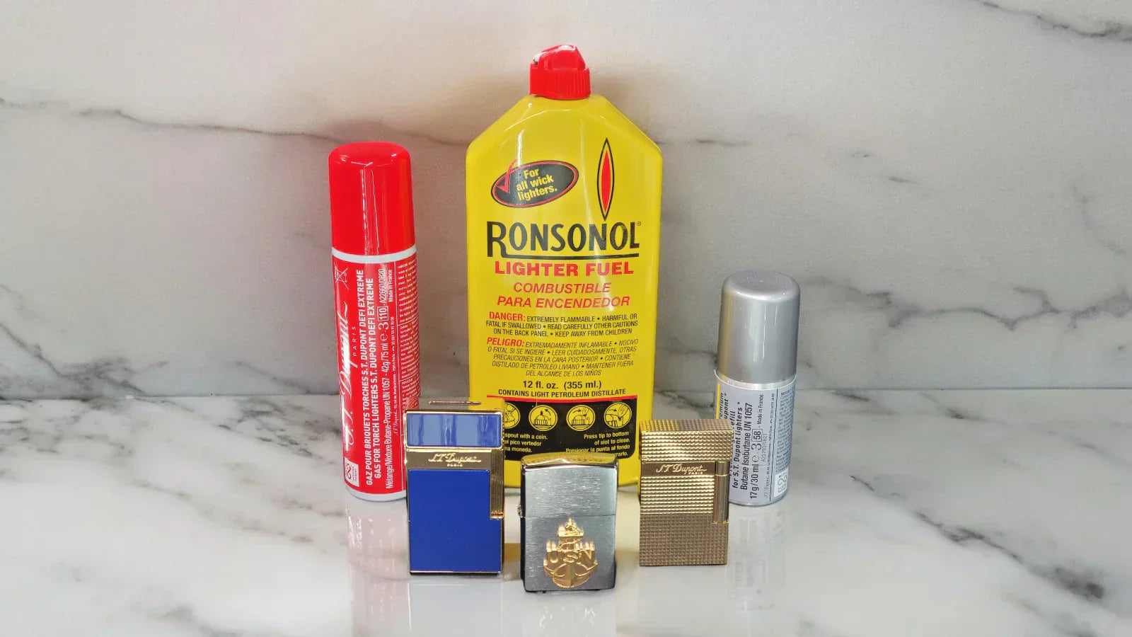 S.T. Dupont lighters, a zippo and the types of refills associated with the lighters.