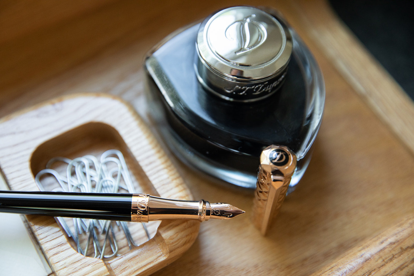Wooden desk set with S.T. Dupont liberte fountain pen and black inwell.