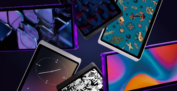 Multiple displays with different wallpapers: clock, abstract, doodle art