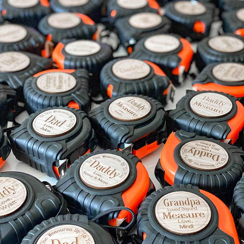 Close-up of Father's Day Tape Measure with Wooden Engraving