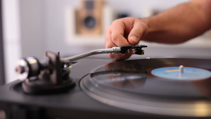 Man Starting Retro Record Player Lay Stock Footage Video (100%  Royalty-free) 13402874 | Shutterstock