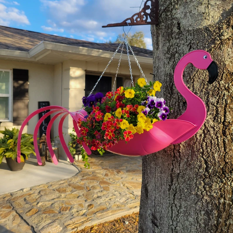 Fancy "Flo" the Flamingo. Definitely a must have. Bright pink in color and manufactured by Versaceco