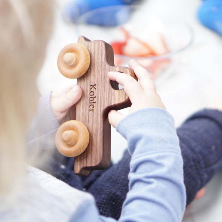 Natural eco-friendly wooden toy car toddler or preschooler toy made from sustainable hardwood