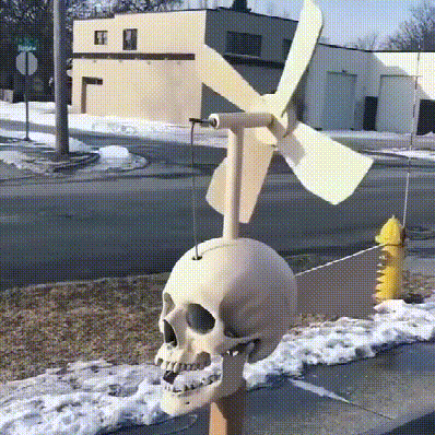 Iron Skull Whirligig - Garden Decor