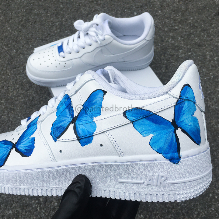 white air forces with blue butterflies