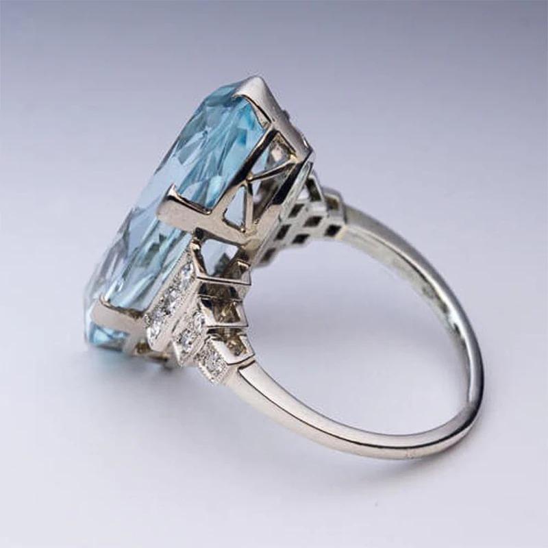 Dazzling Blue Zircon Ring with Side Rhinestone Accents-xinru