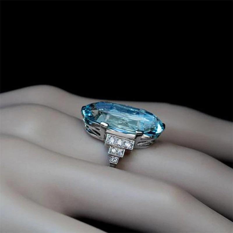 Dazzling Blue Zircon Ring with Side Rhinestone Accents-xinru