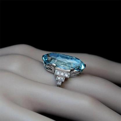 Dazzling Blue Zircon Ring with Side Rhinestone Accents-xinru