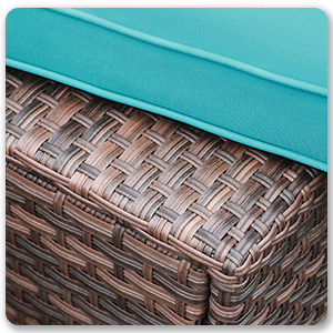 blue curved sofa wicker