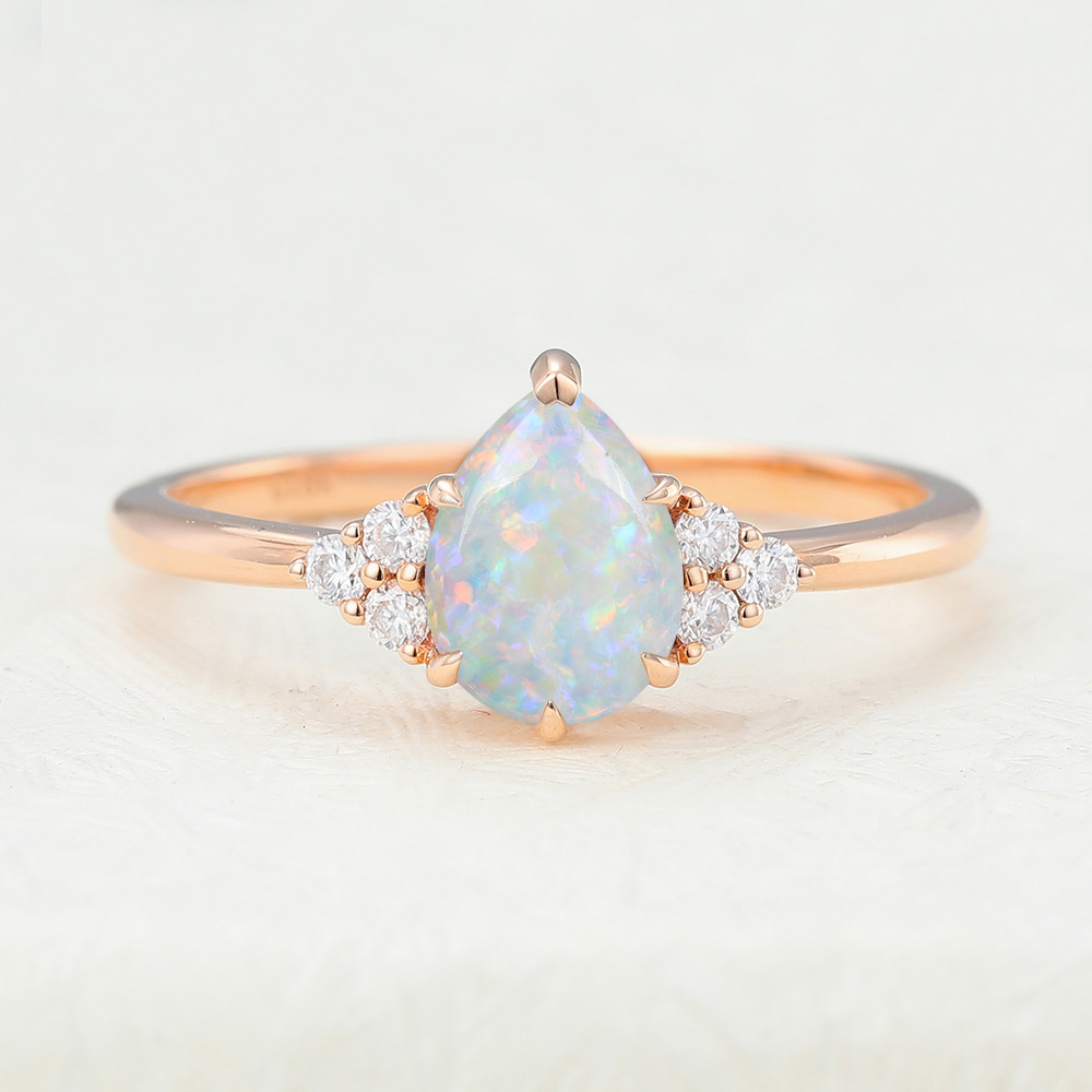Juyoyo pear shaped opal rose gold engagement ring