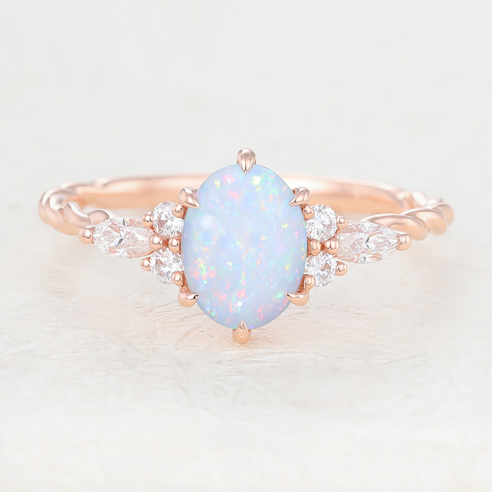 Juyoyo oval cut opal rose gold twisted engagement ring