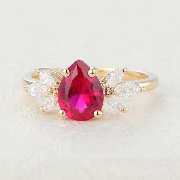 pear ruby engagement ring yellow gold