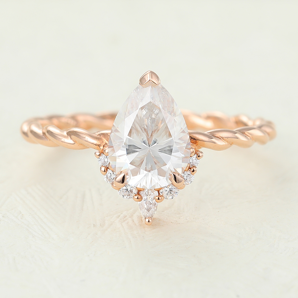 Juyoyo pear shaped moissanite rose gold twisted engagement ring