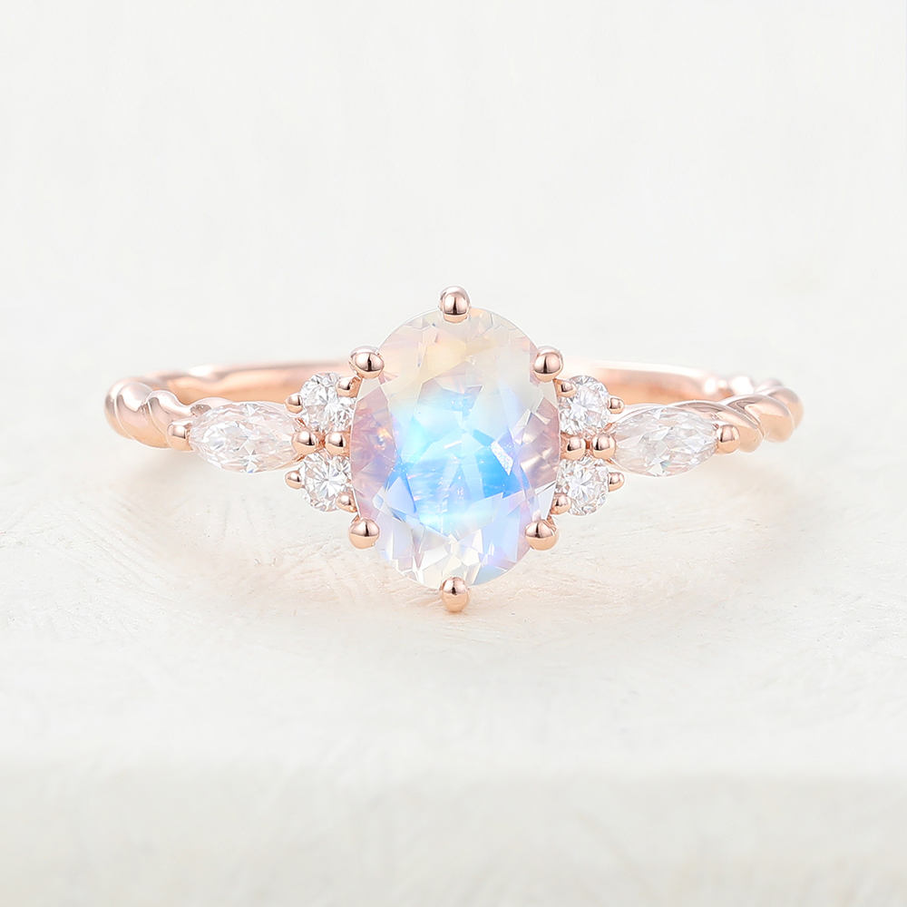 Juyoyo Oval Cut Rainbow Moonstone Twisted Ring with Diamond Accents for Women