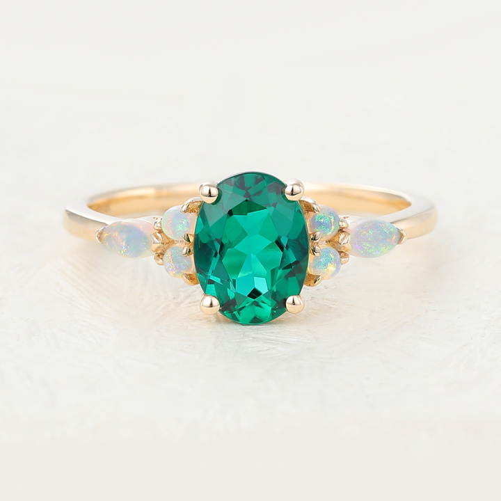 Oval Cut Emerald Yellow Gold Engagement Ring
