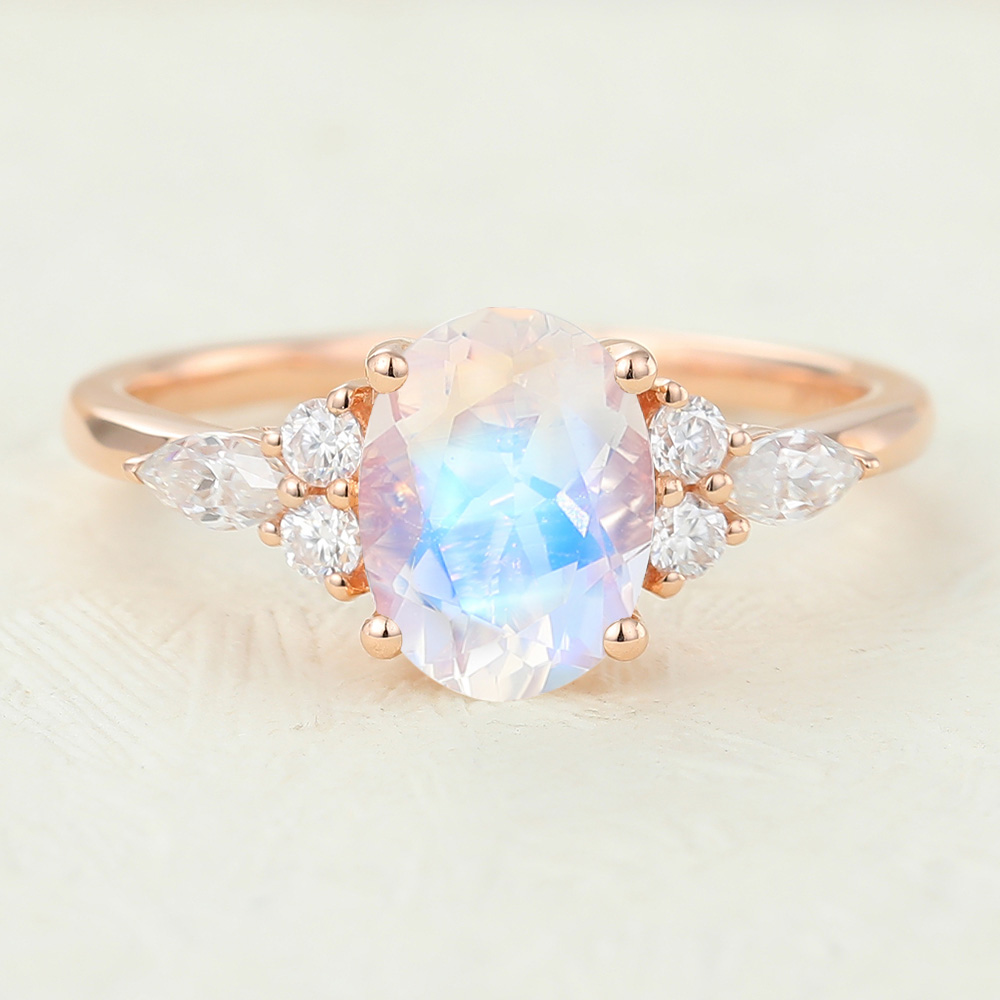 Oval Rainbow Moonstone and Diamond Side Stone Engagement Ring