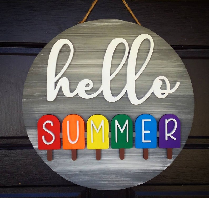 Seasonal interchangeable door hanger