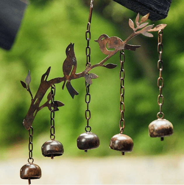 Flickering bell bird with wind chimes