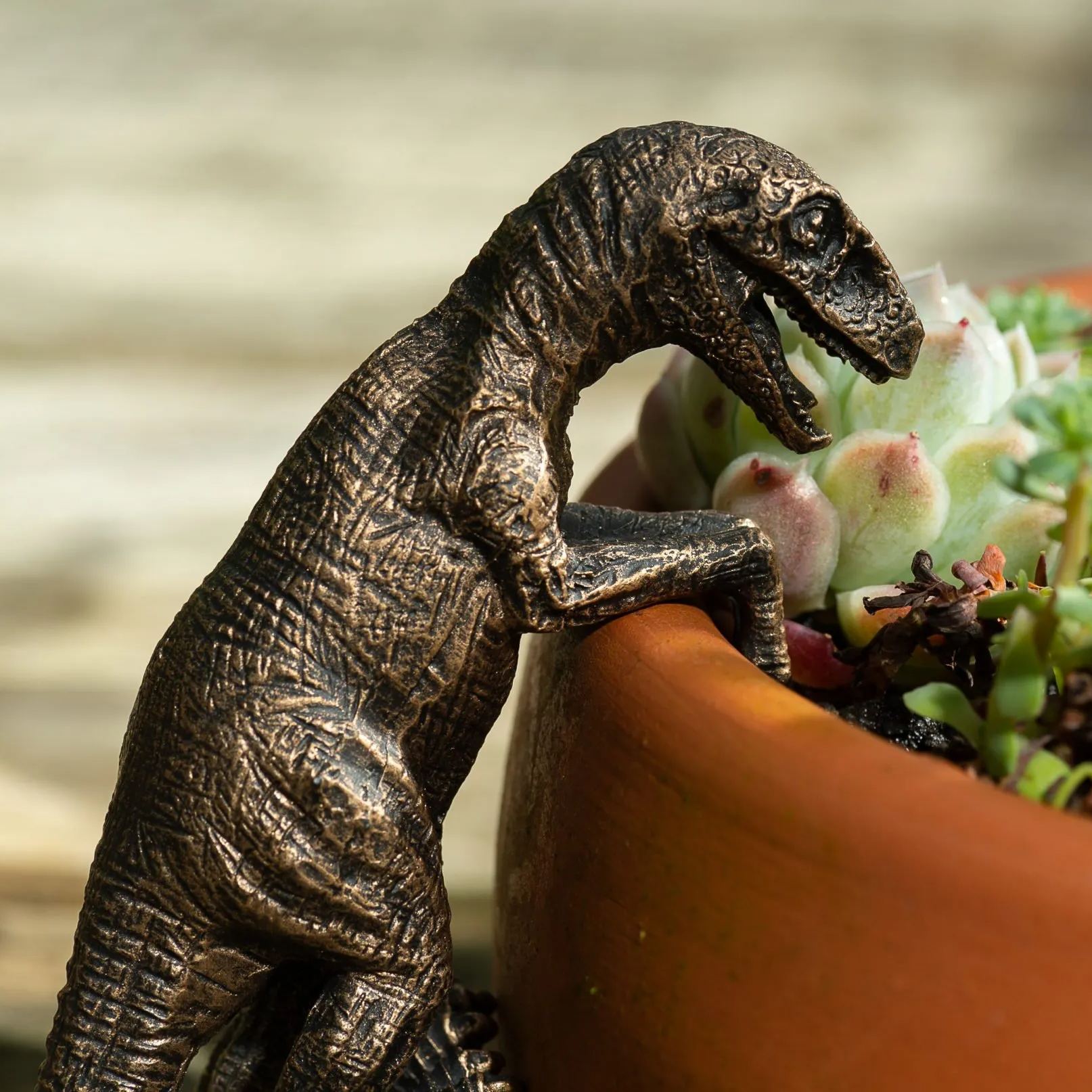 Bronze Velociraptor Pot Buddy