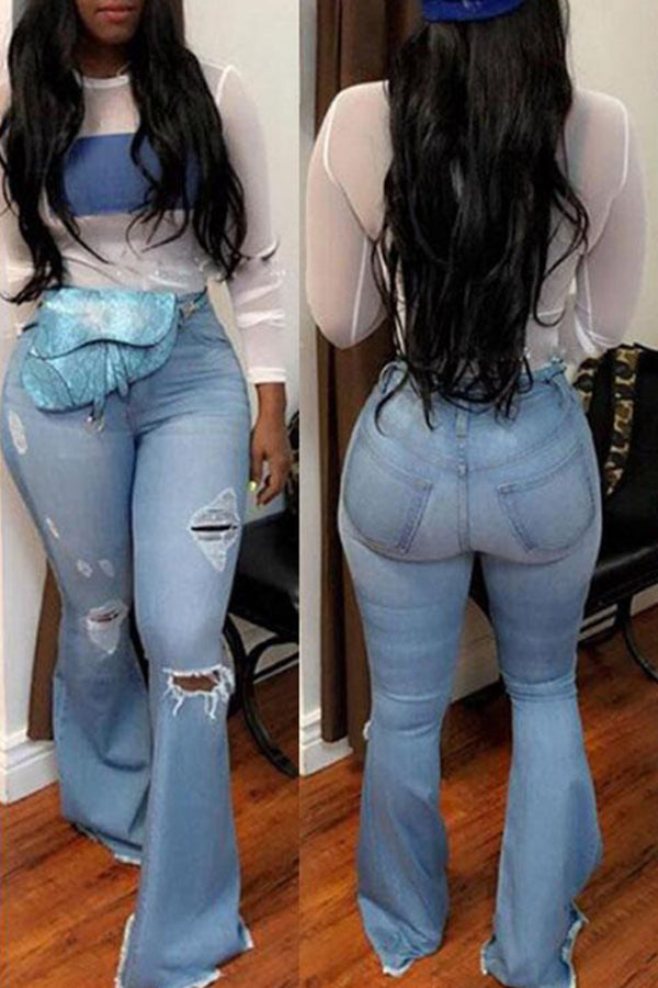 Vintage High Rise Ripped Ripped Flared Jeans