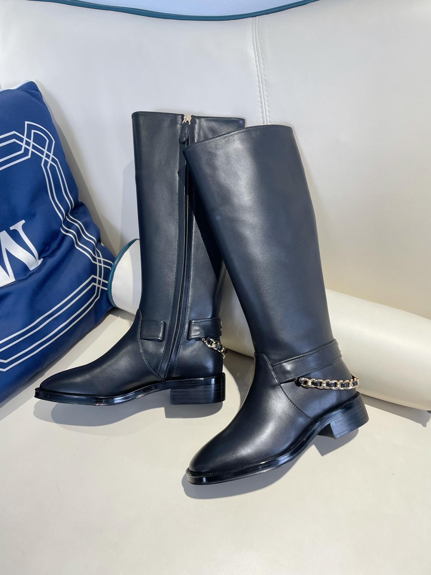 Chanel plush inside high knee boots with chain 