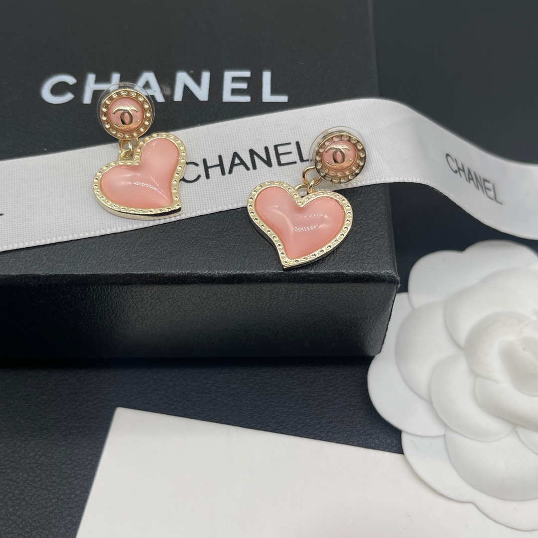 Chanel heart-shaped stud earrings