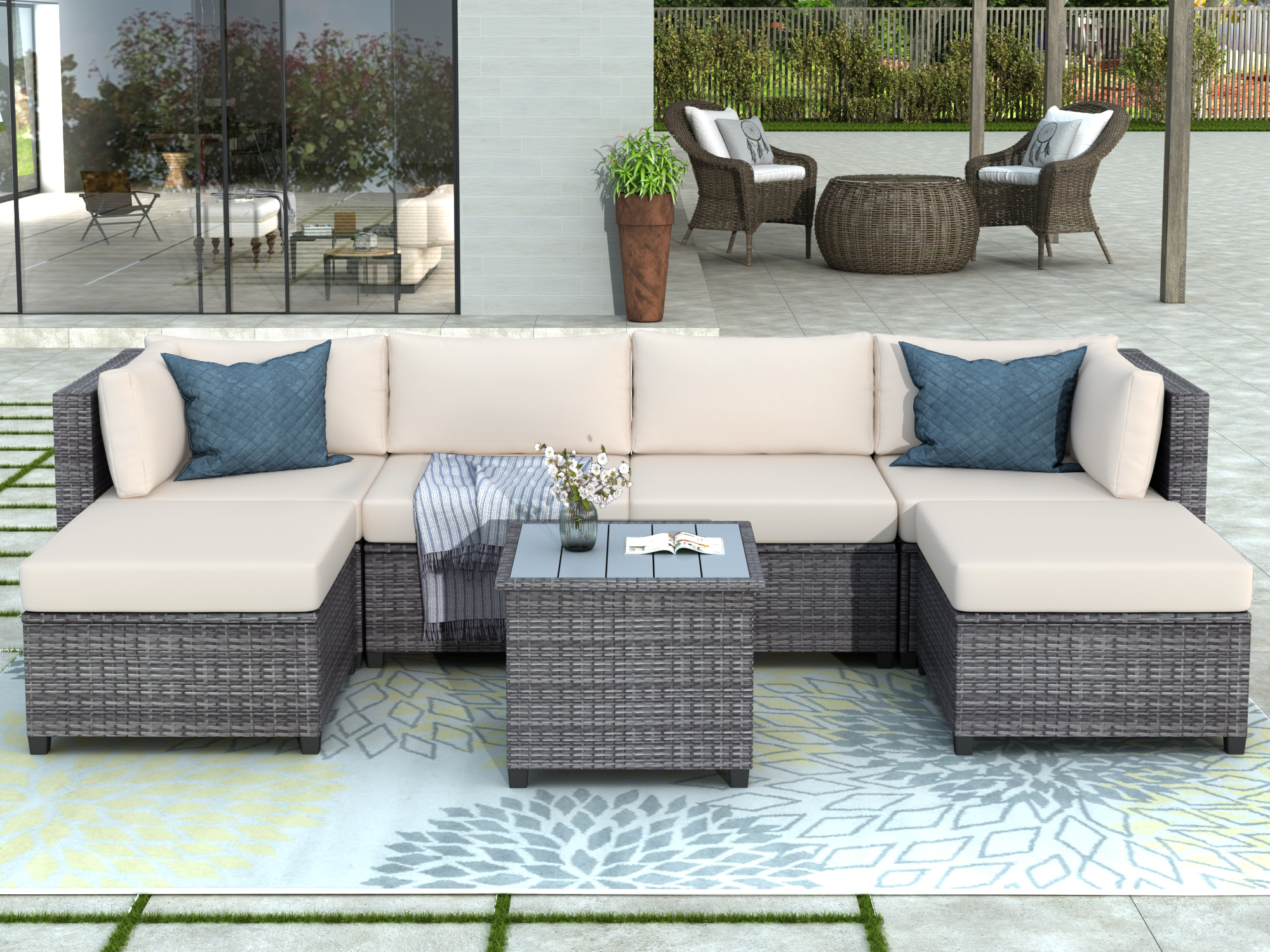 7 piece rattan sectional seating group with cushions