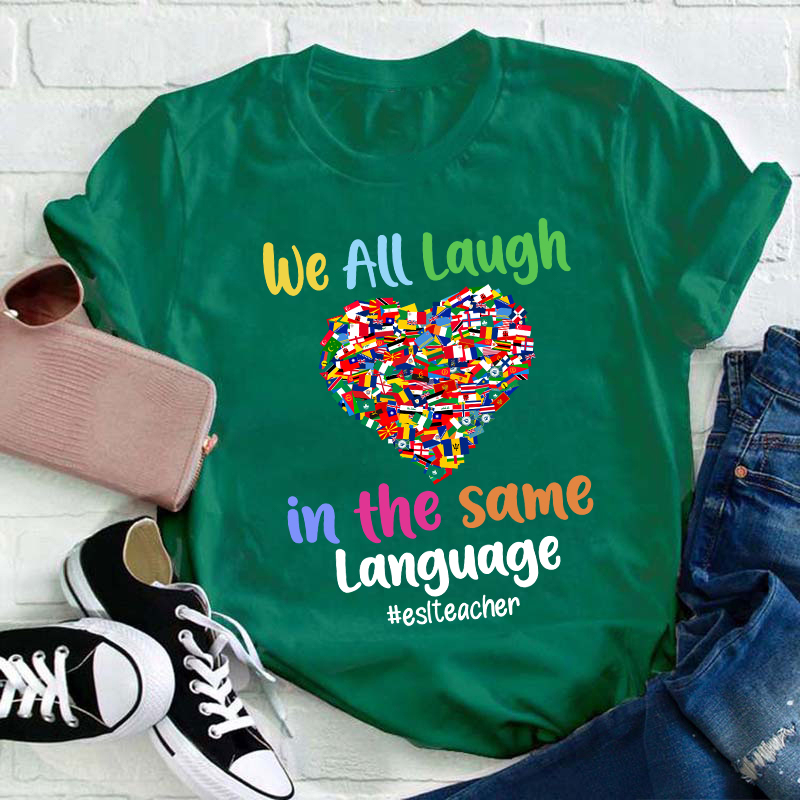 We All Laugh In The Same Language Teacher T-Shirt