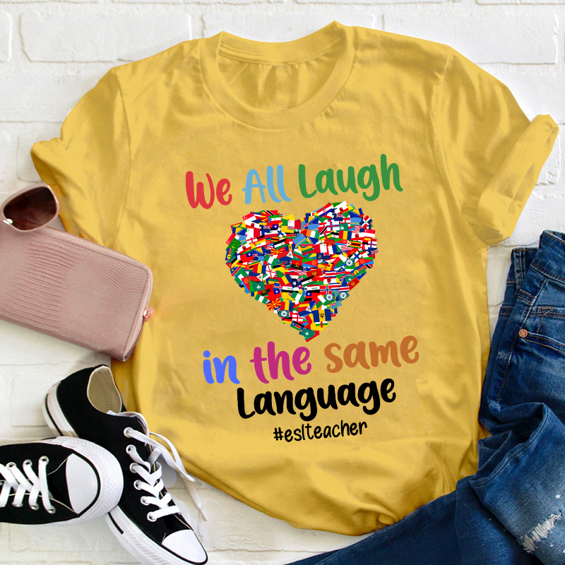 We All Laugh In The Same Language Teacher T-Shirt