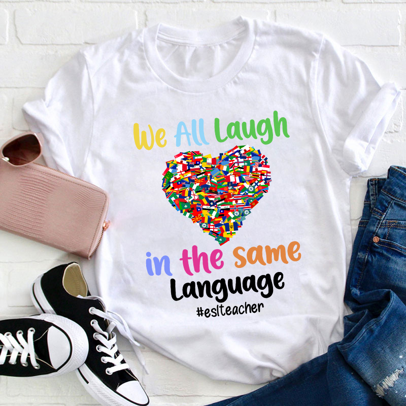 We All Laugh In The Same Language Teacher T-Shirt