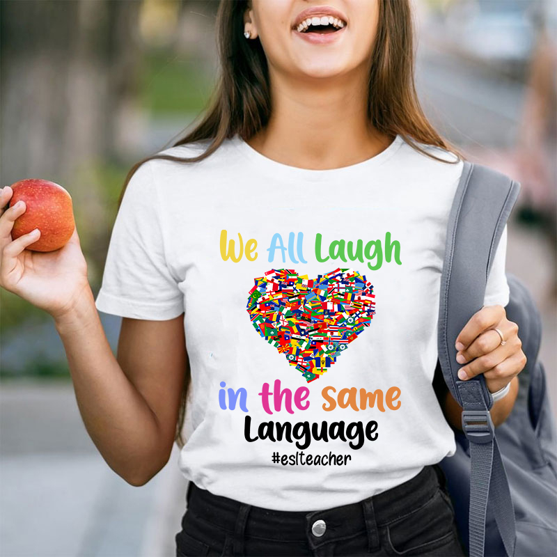 We All Laugh In The Same Language Teacher T-Shirt
