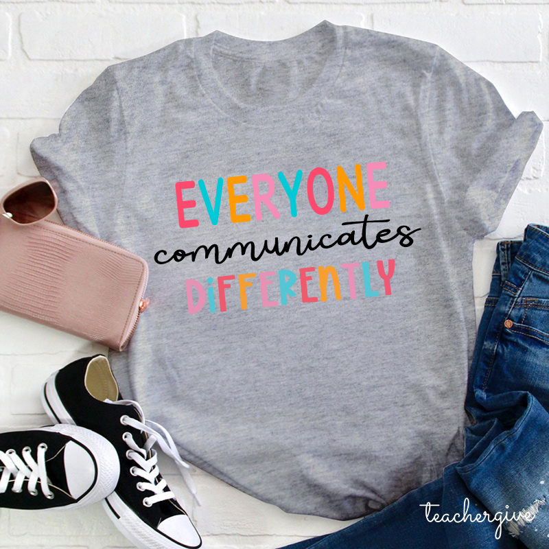 Everyone Communicates Differently Teacher T-Shirt