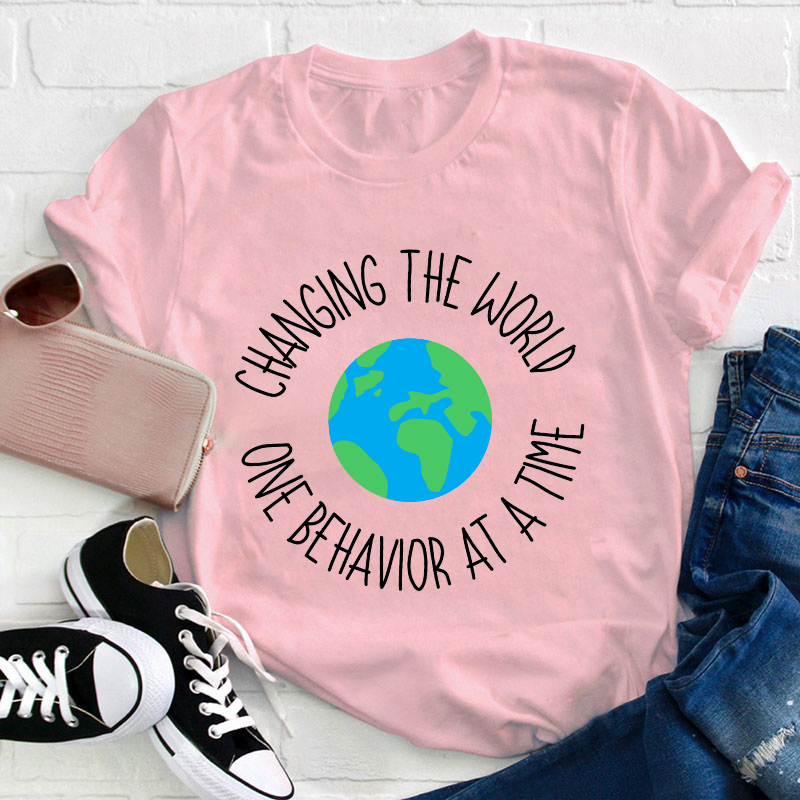 Changing The World One Behavior At A Time Teacher T-Shirt