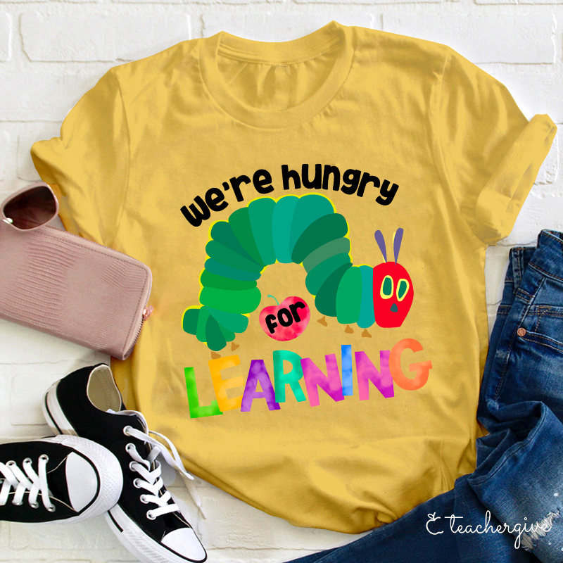 We Are Hungry Learning Teacher T-Shirt