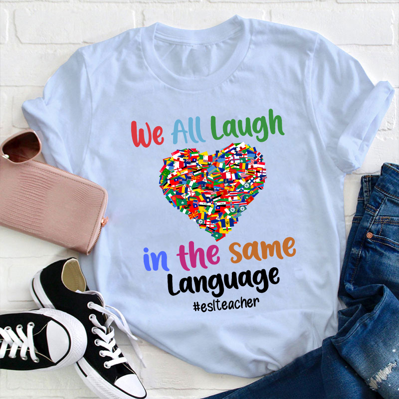 We All Laugh In The Same Language Teacher T-Shirt